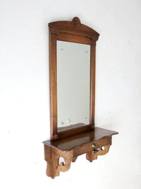 antique Victorian mirror with wall shelf
