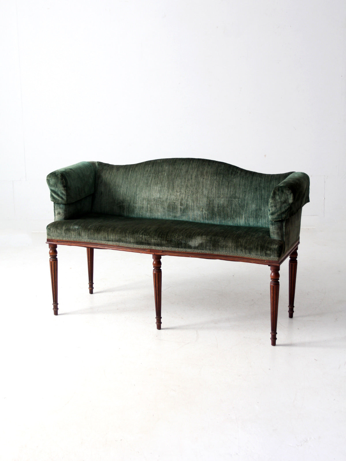 antique Neoclassical settee with velvet upholstery