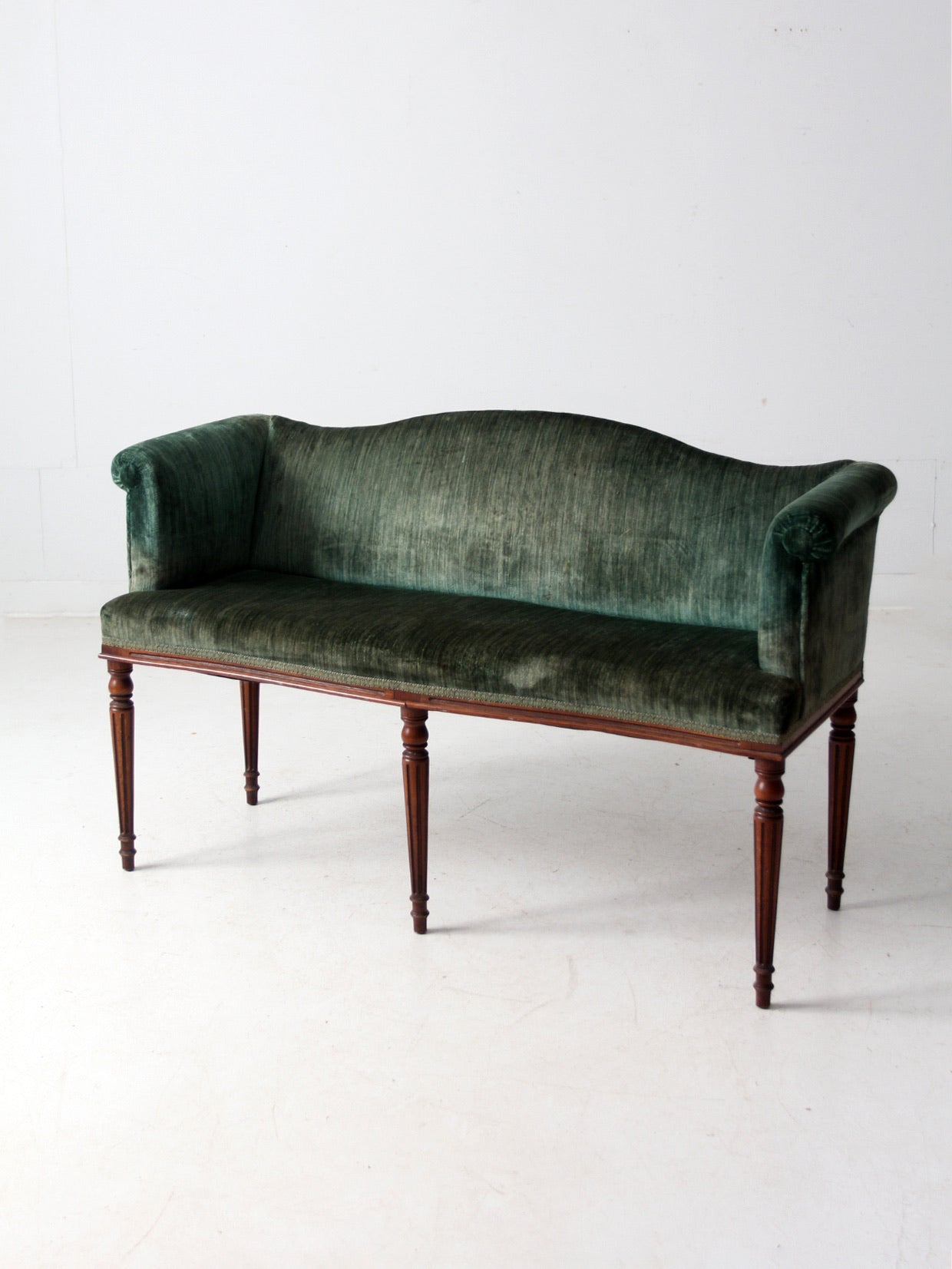antique Neoclassical settee with velvet upholstery