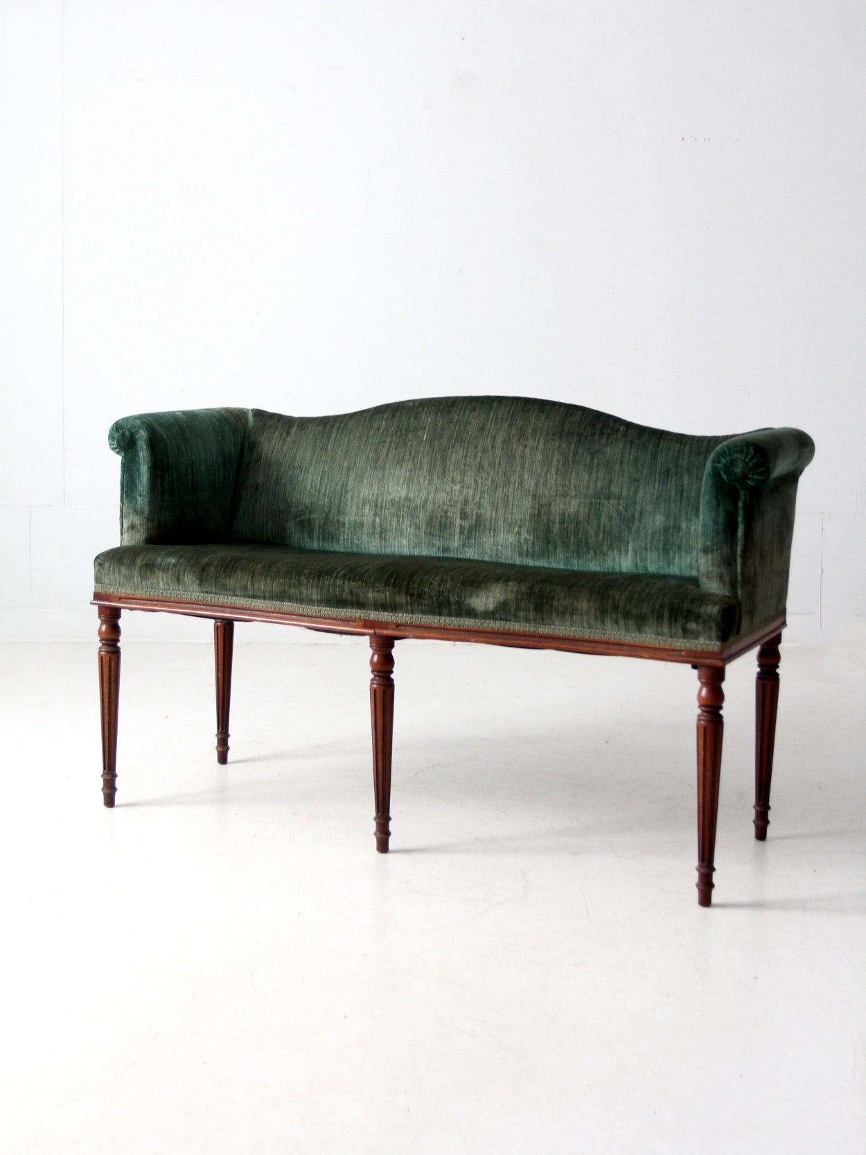 antique Neoclassical settee with velvet upholstery