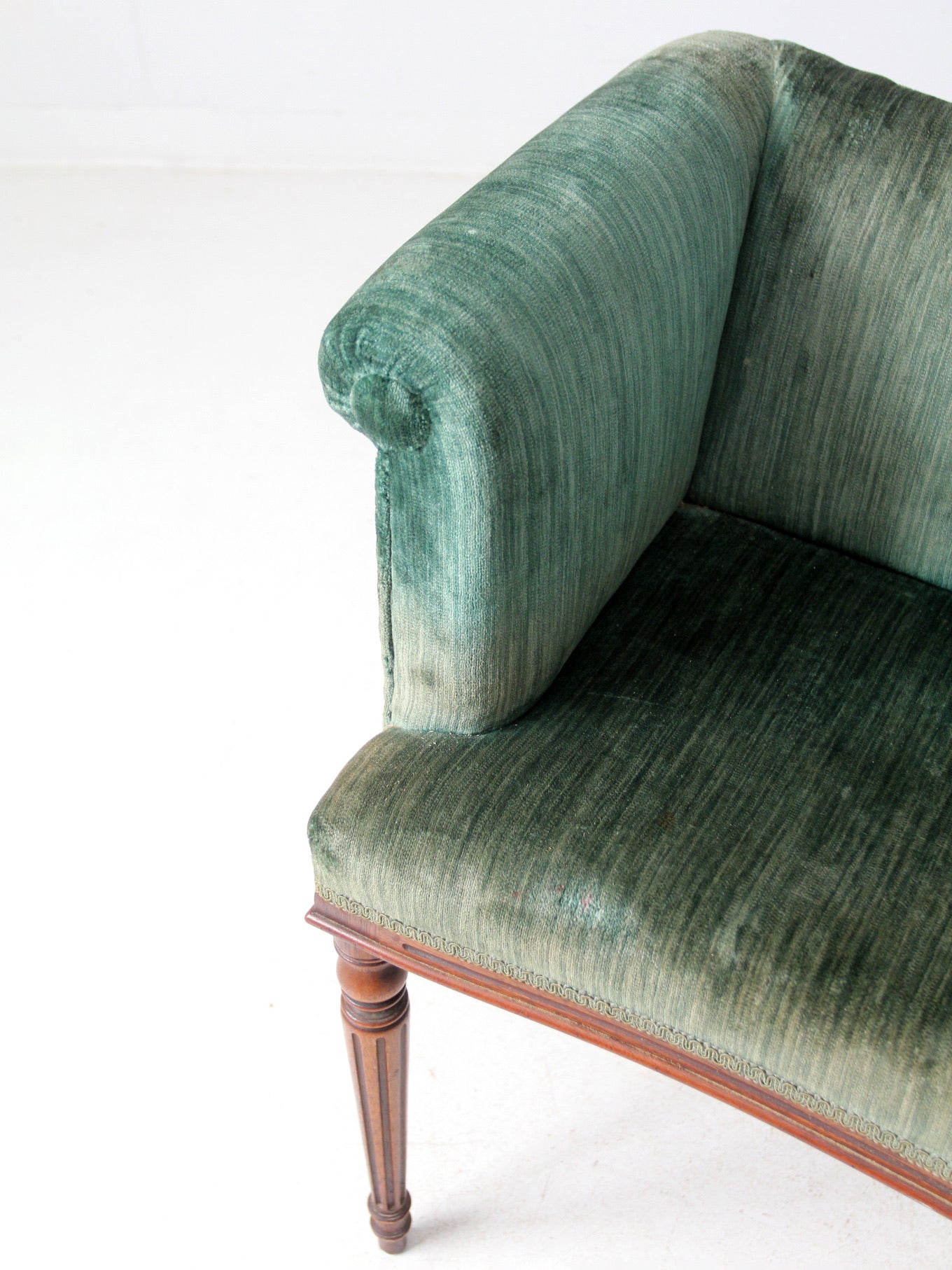 antique Neoclassical settee with velvet upholstery