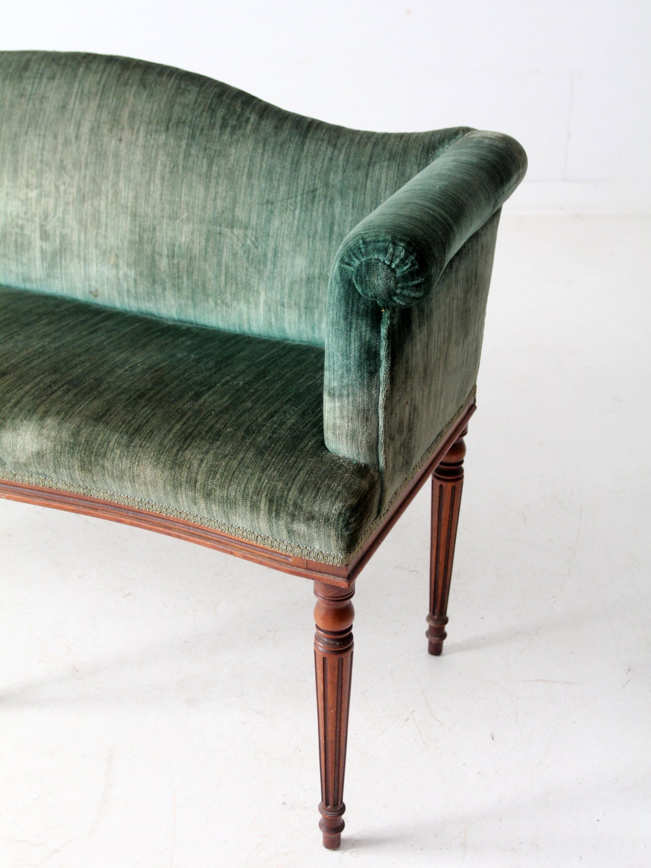 antique Neoclassical settee with velvet upholstery