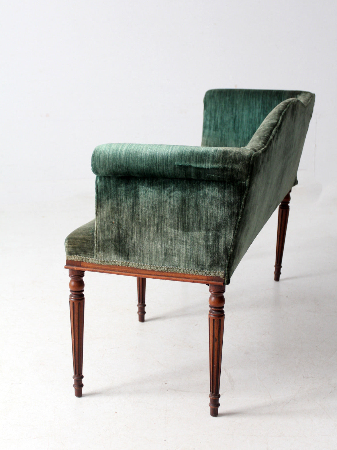 antique Neoclassical settee with velvet upholstery