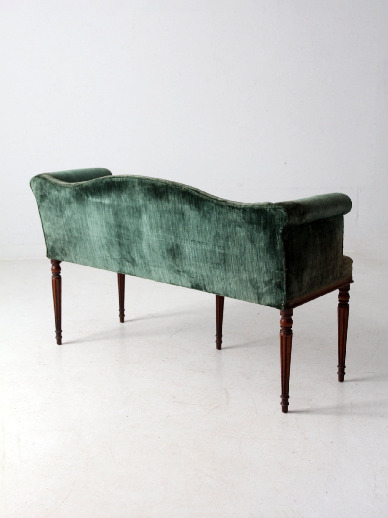 antique Neoclassical settee with velvet upholstery