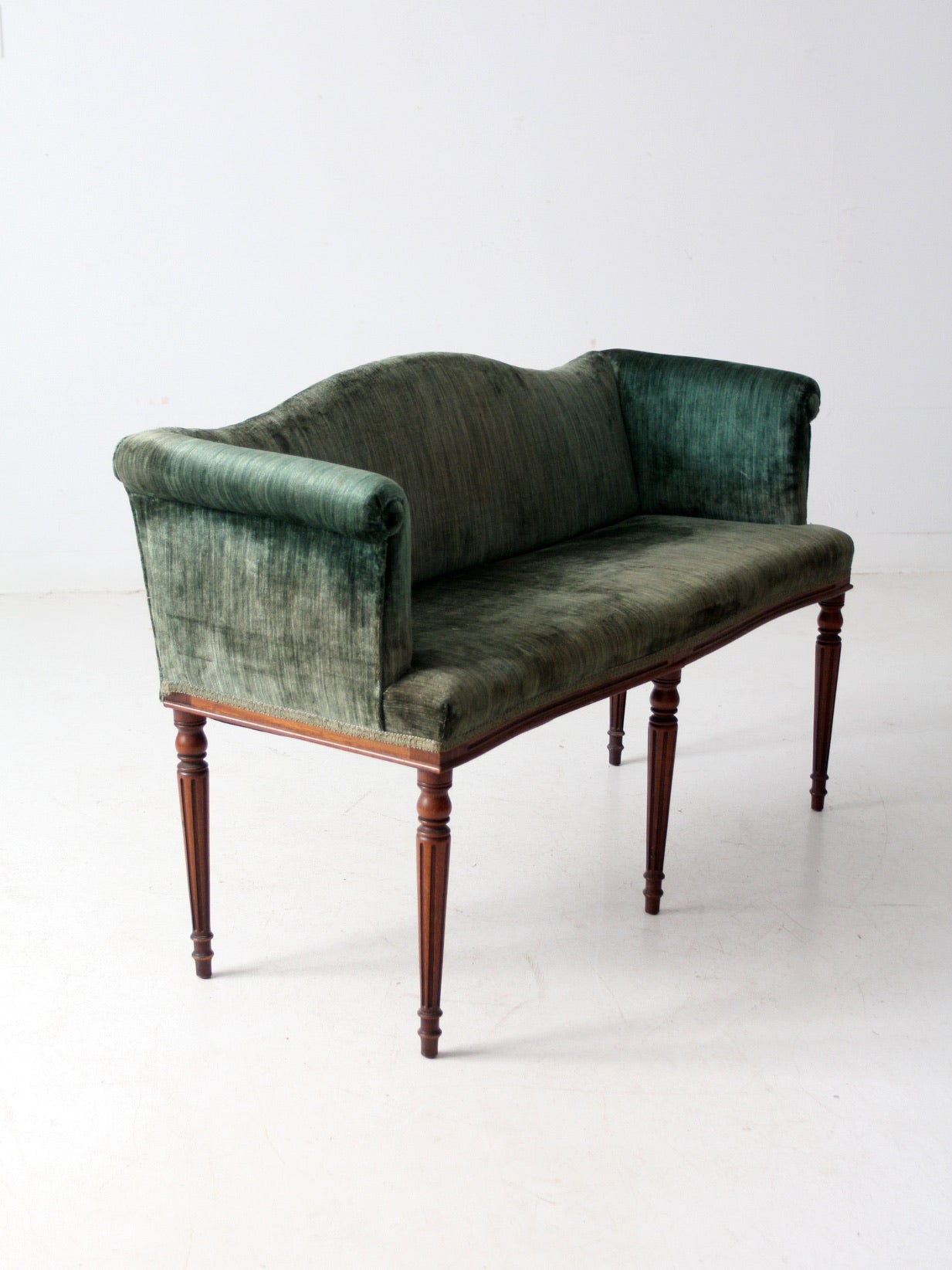 antique Neoclassical settee with velvet upholstery
