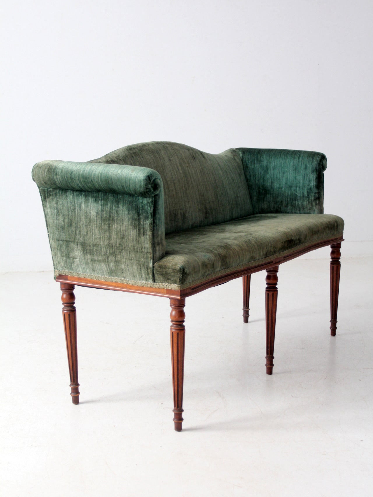 antique Neoclassical settee with velvet upholstery