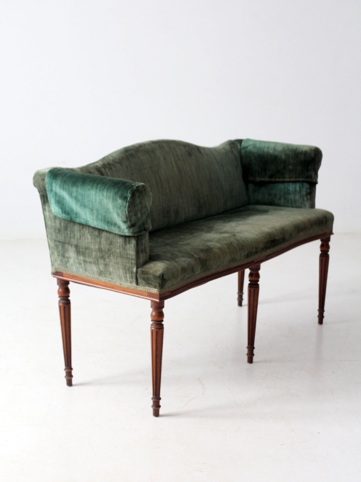 antique Neoclassical settee with velvet upholstery