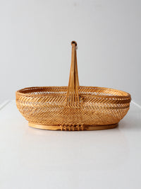 vintage 1970s rattan basket with handle