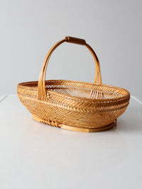 vintage 1970s rattan basket with handle