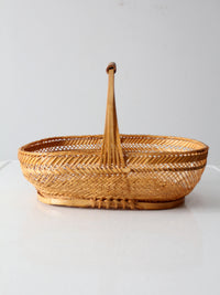 vintage 1970s rattan basket with handle