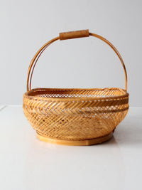 vintage 1970s rattan basket with handle