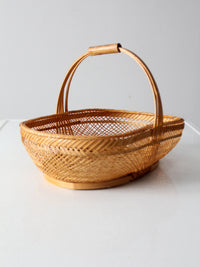 vintage 1970s rattan basket with handle