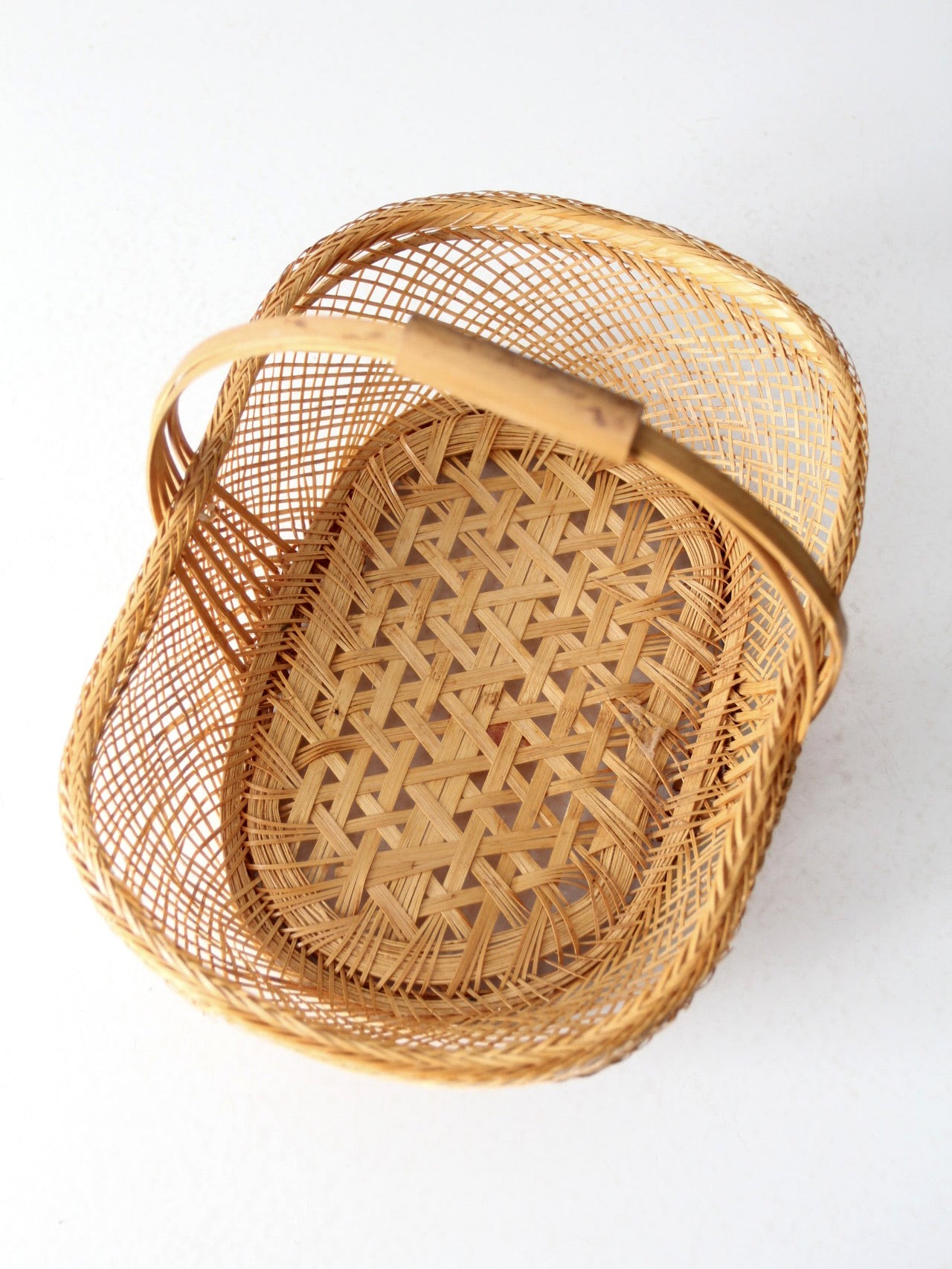 vintage 1970s rattan basket with handle