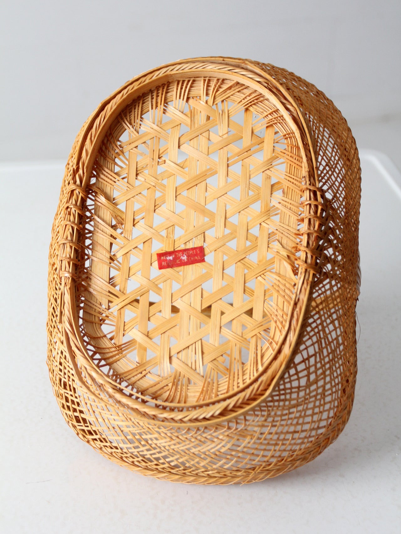 vintage 1970s rattan basket with handle