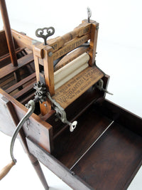 antique Brighton wringer with laundry wash stand