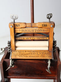 antique Brighton wringer with laundry wash stand