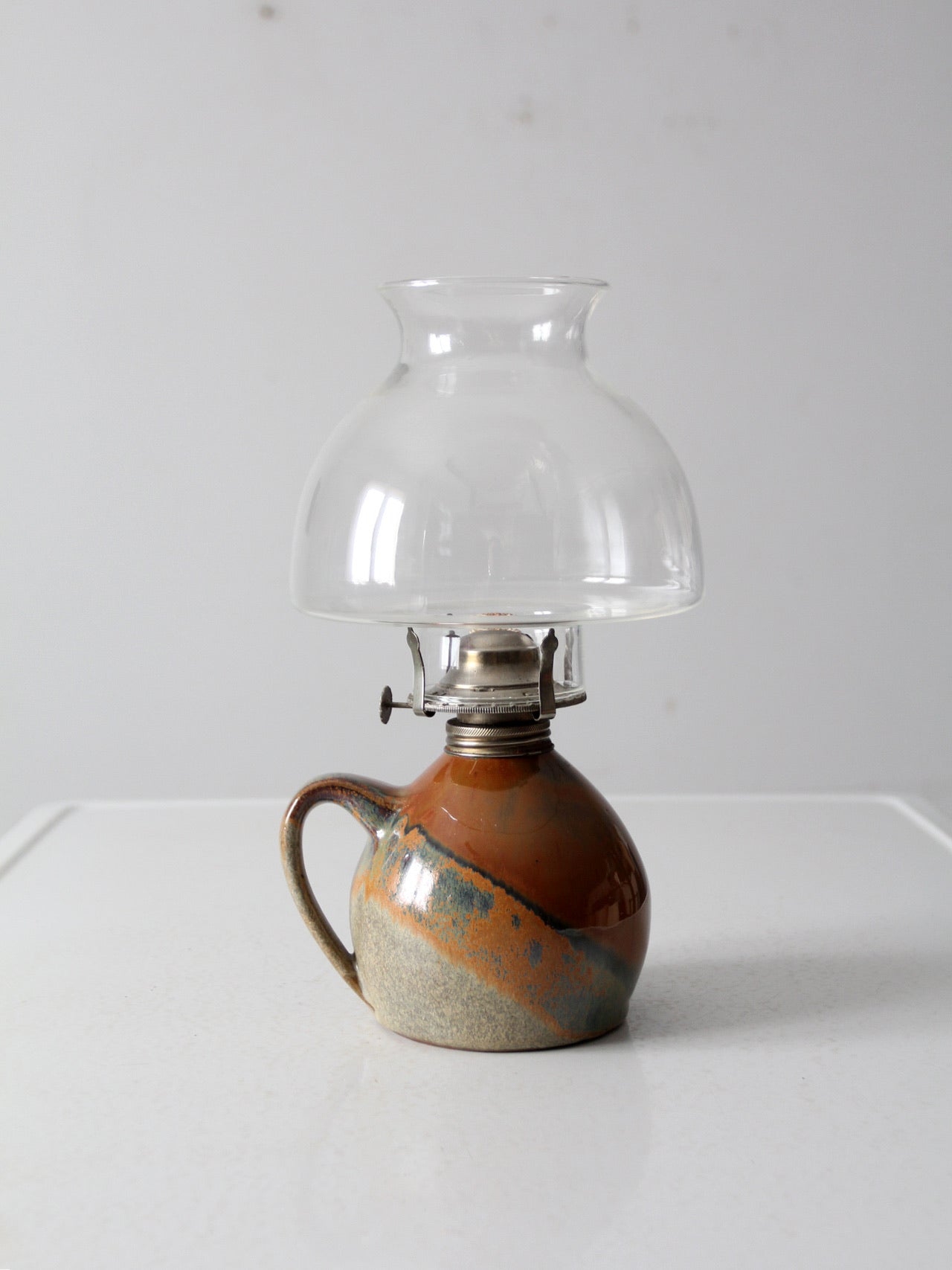 vintage studio pottery oil lamp with hurricane