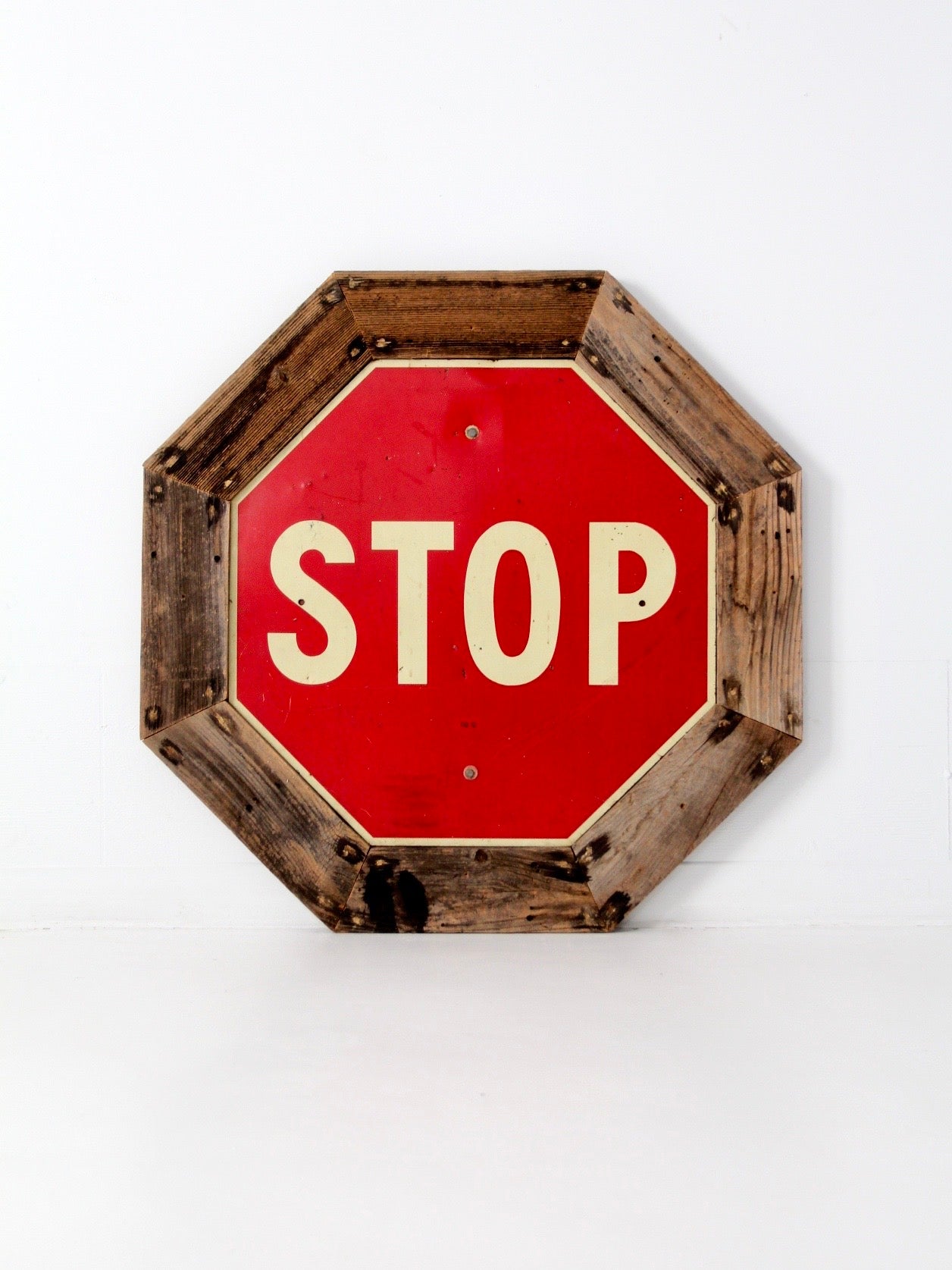 vintage Stop sign with barn wood frame