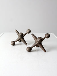 mid-century cast iron jacks pair