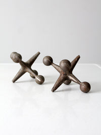 mid-century cast iron jacks pair