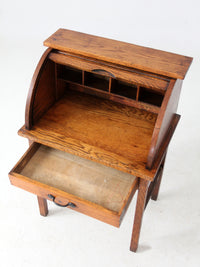 antique child's roll-top secretary desk