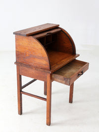 antique child's roll-top secretary desk
