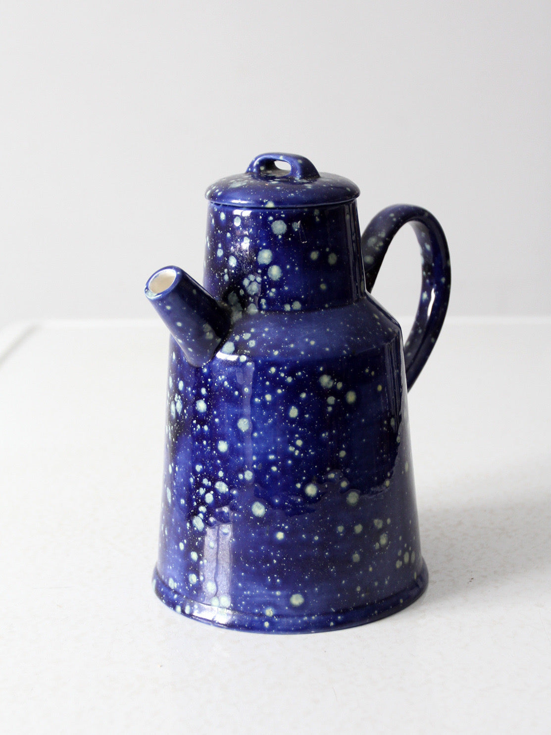 vintage blue ceramic teapot - enamelware style