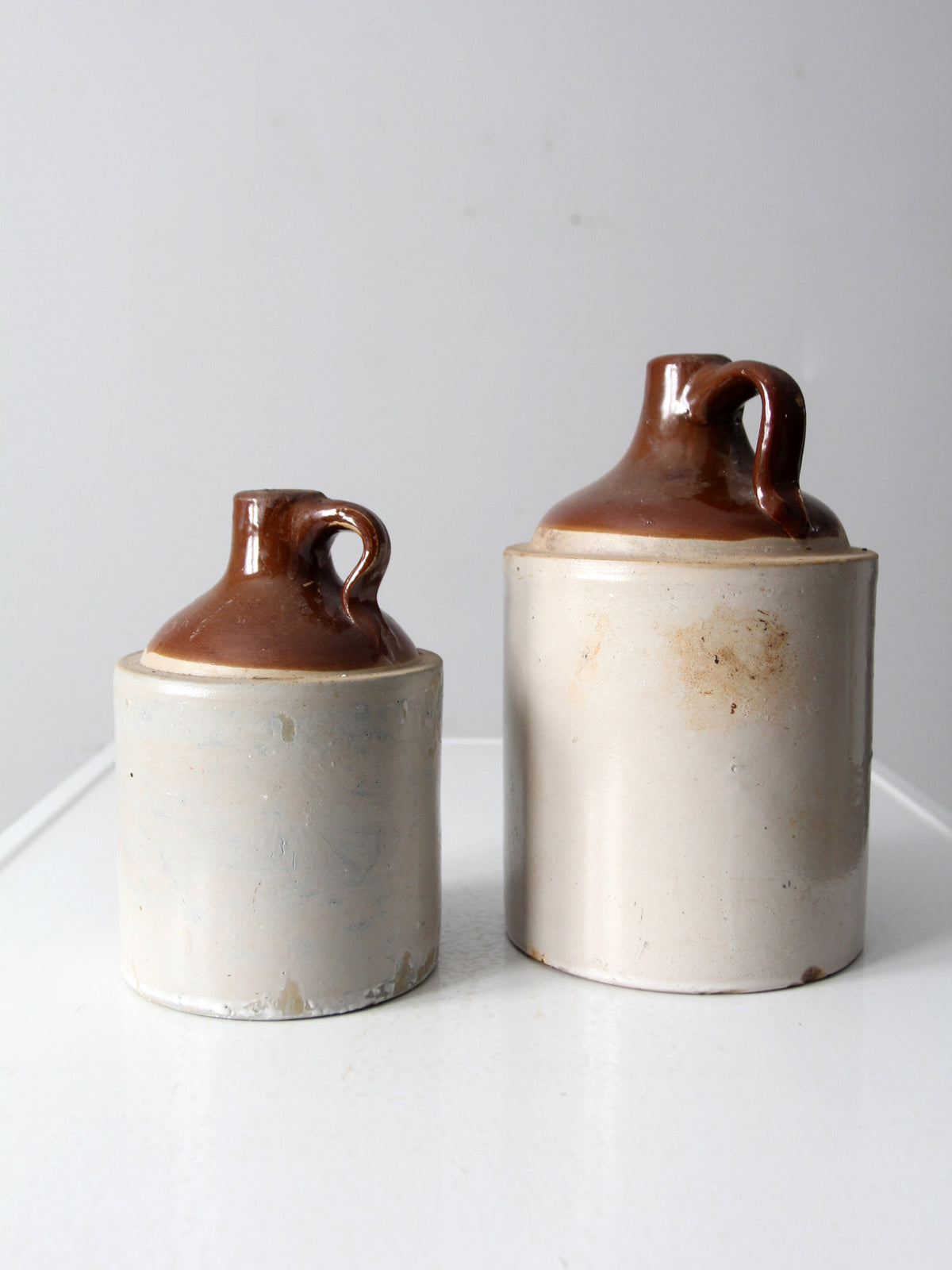 antique stoneware jugs pair