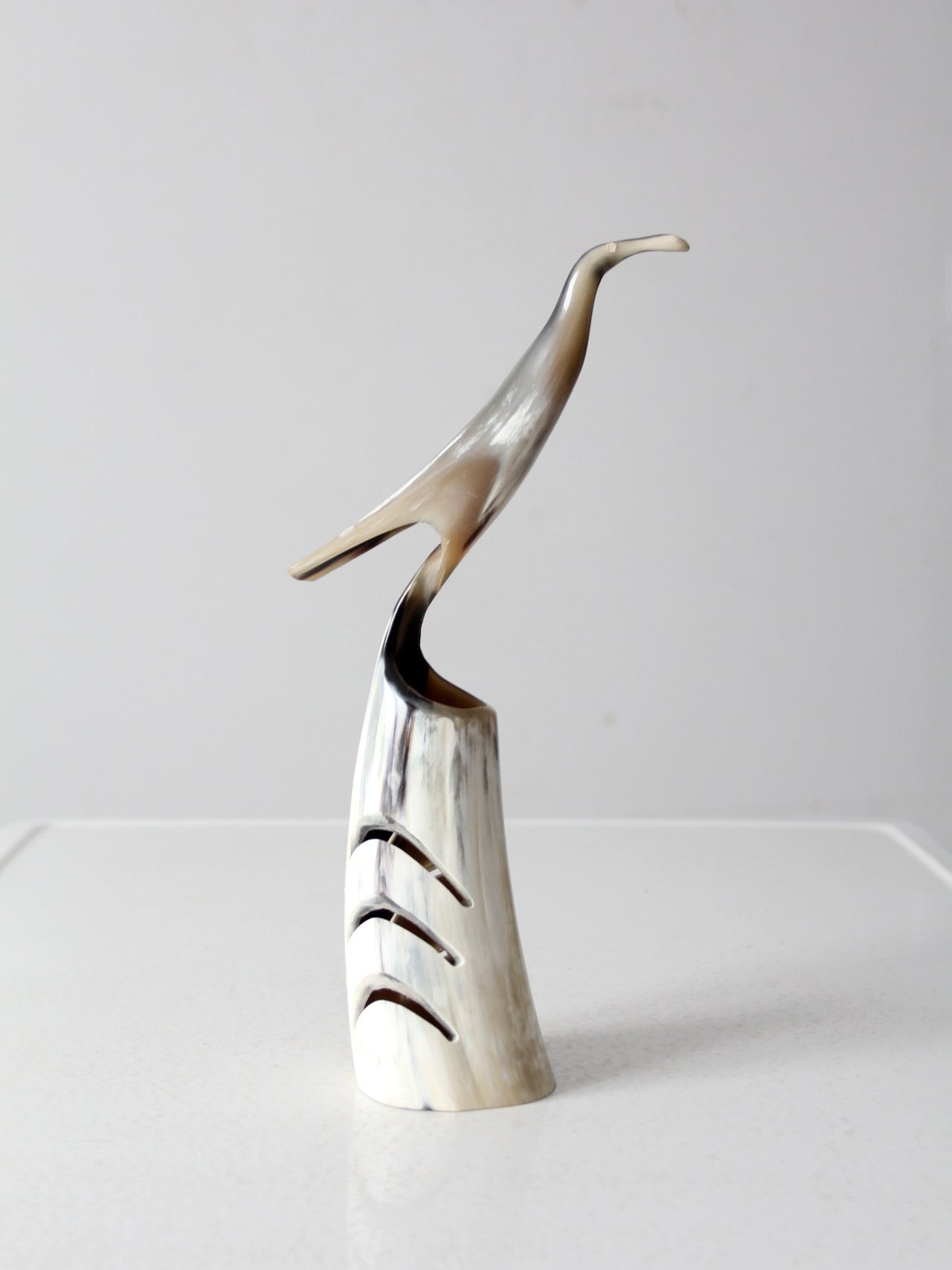 vintage polished horn bird sculpture