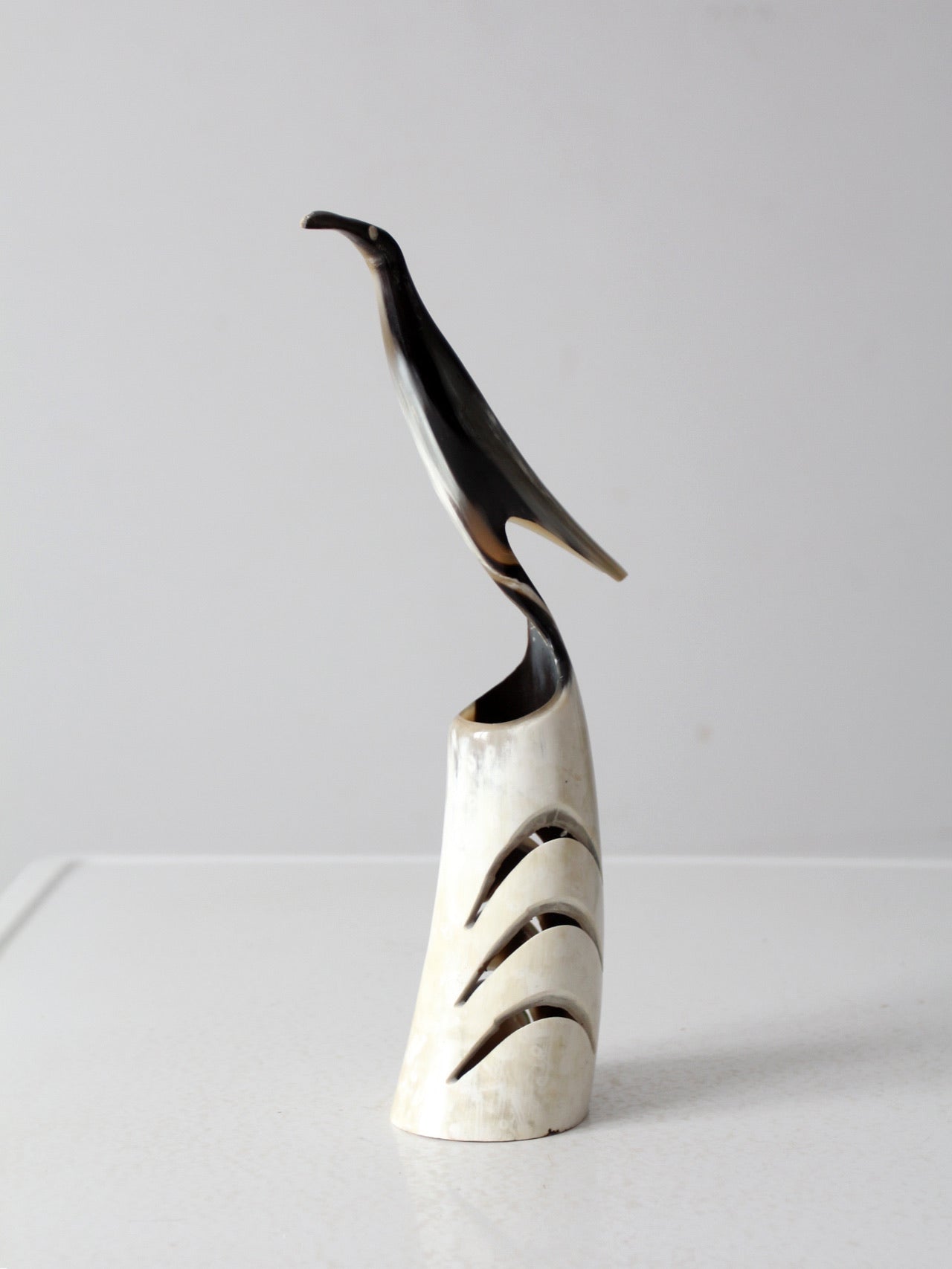 vintage polished horn bird sculpture