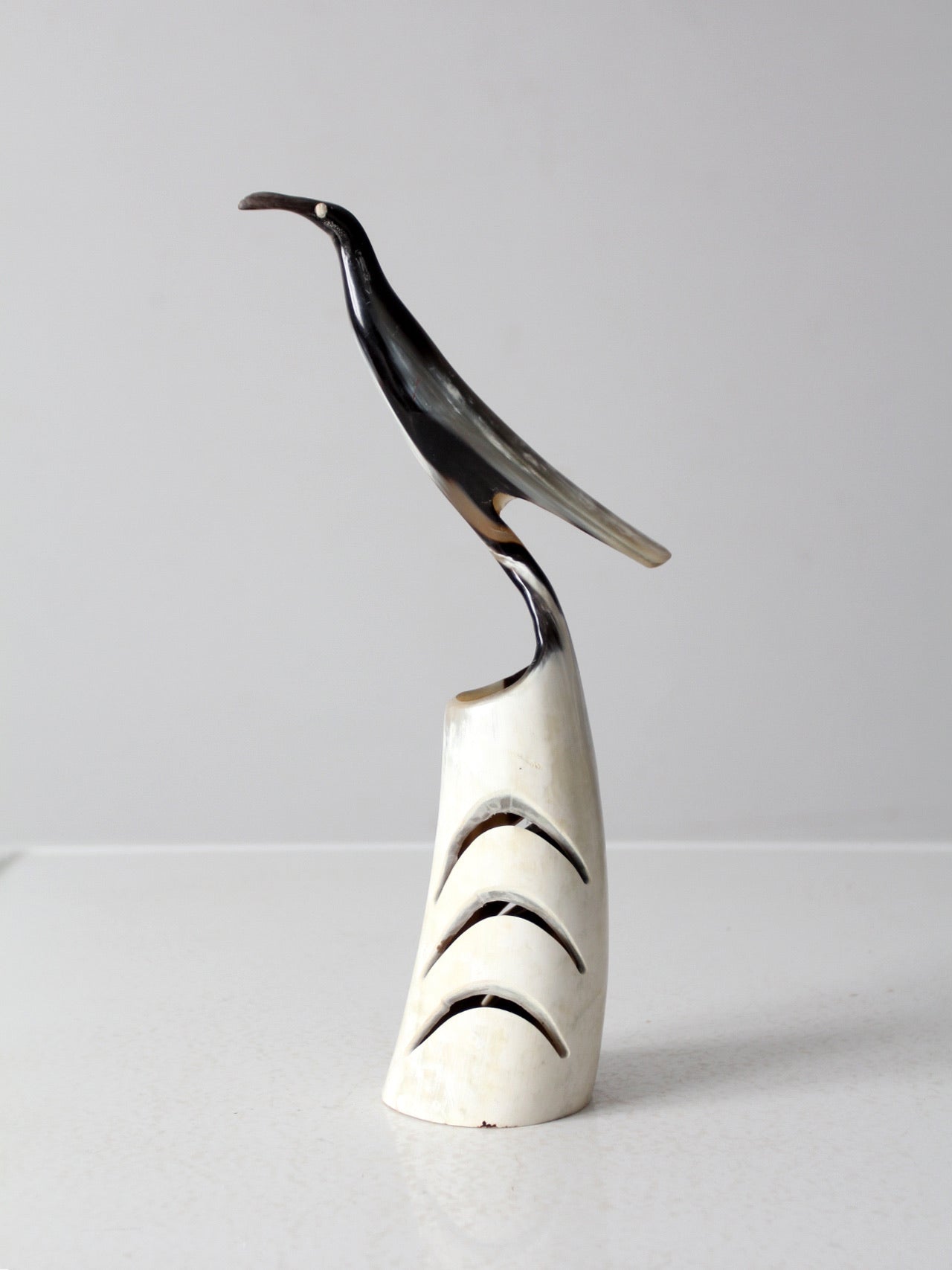vintage polished horn bird sculpture