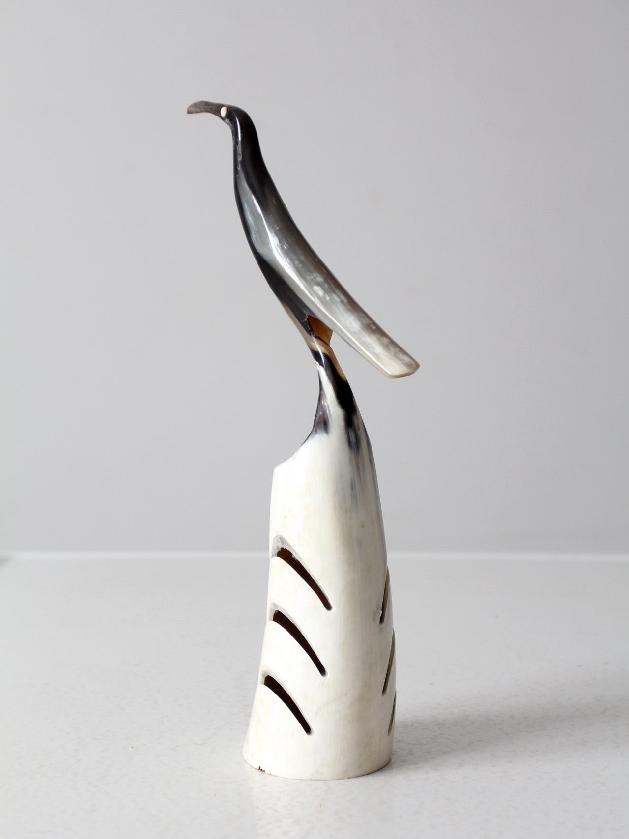 vintage polished horn bird sculpture