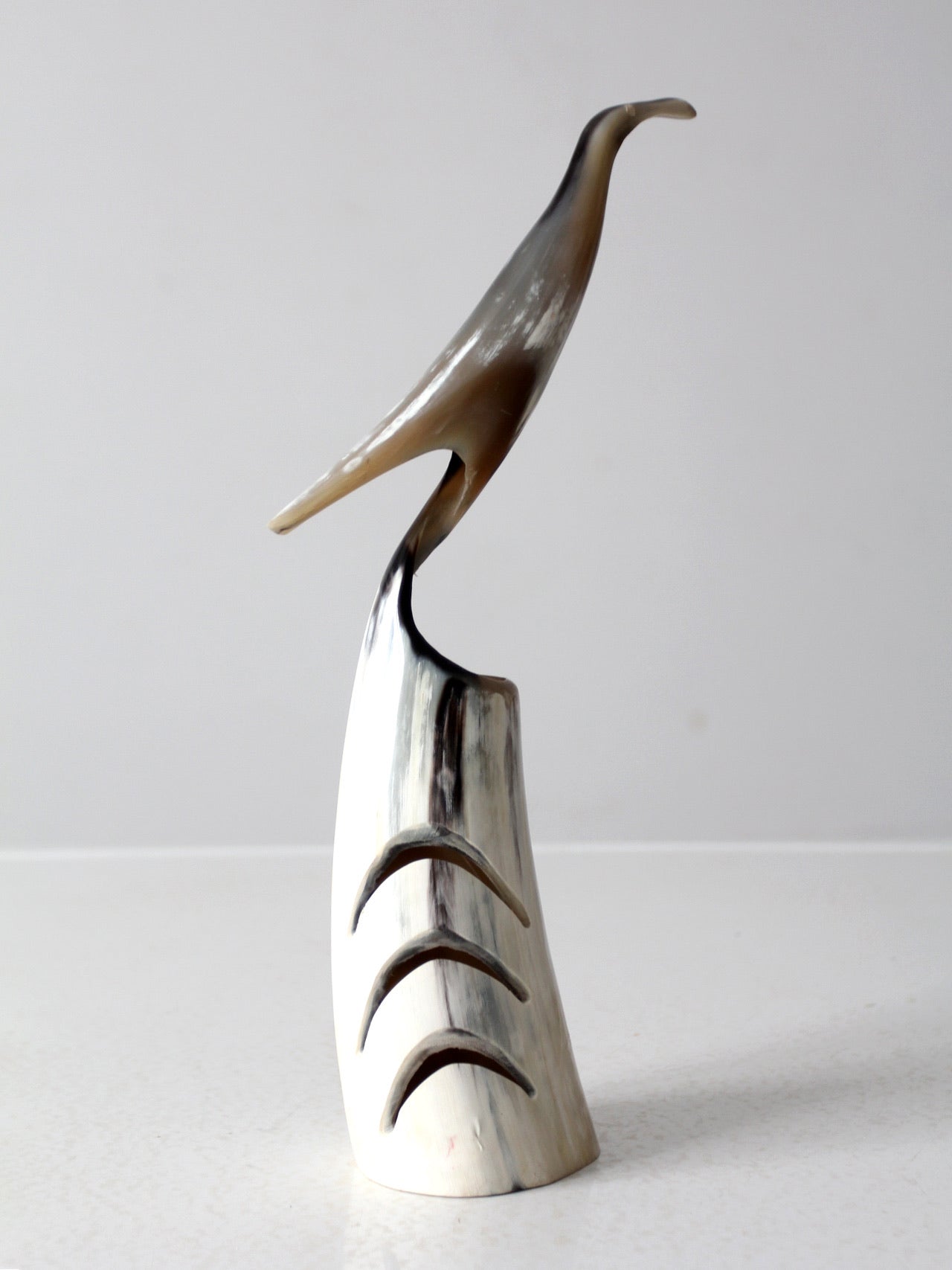 vintage polished horn bird sculpture