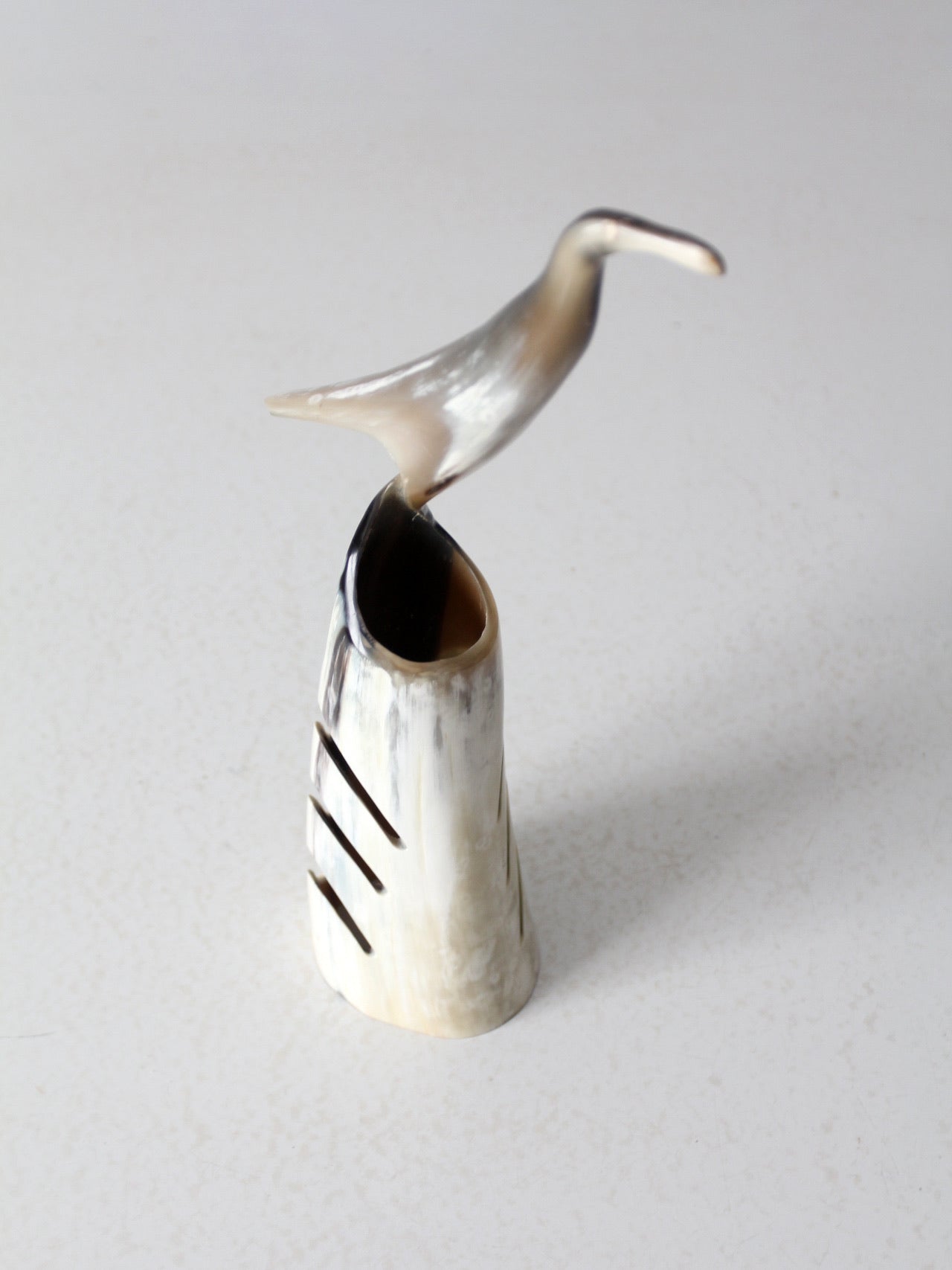 vintage polished horn bird sculpture