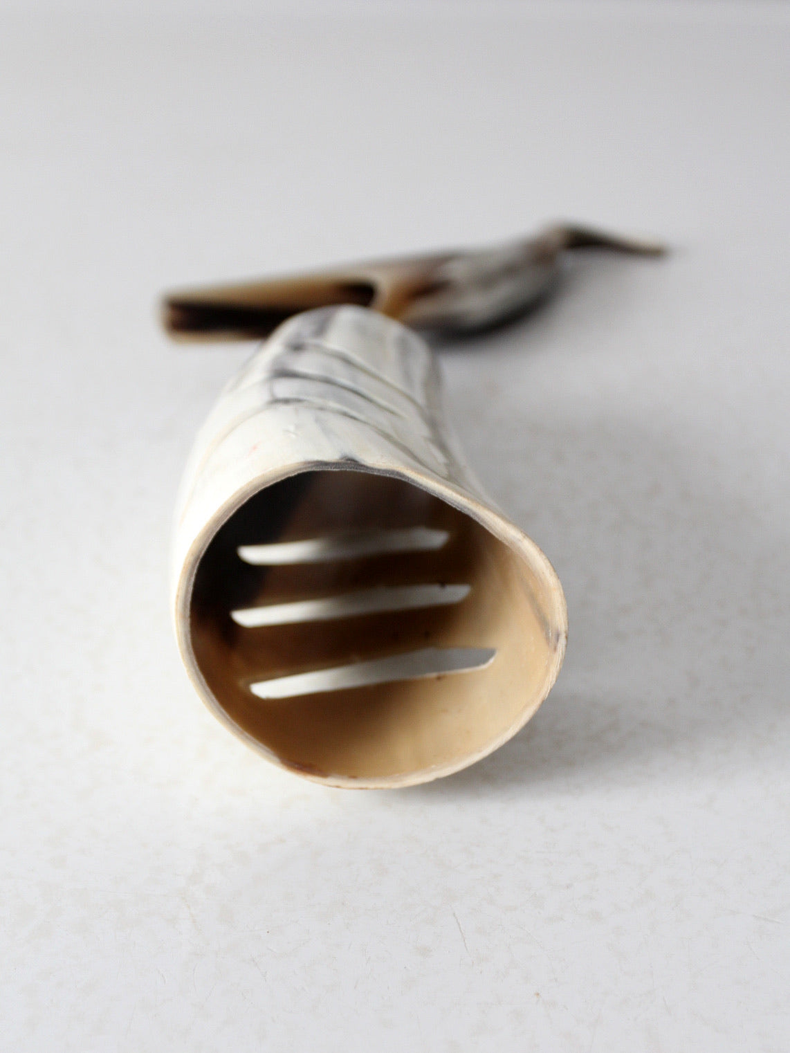 vintage polished horn bird sculpture