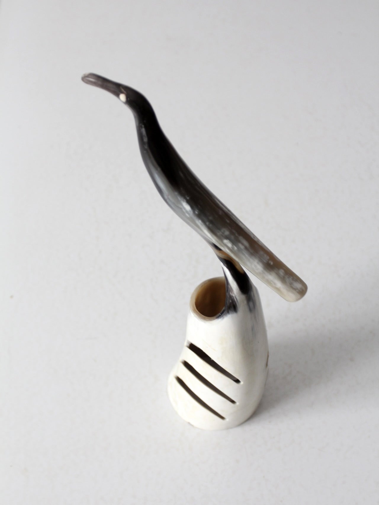 vintage polished horn bird sculpture