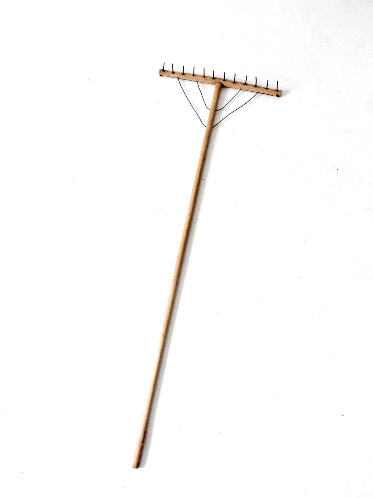 antique wooden hay rake