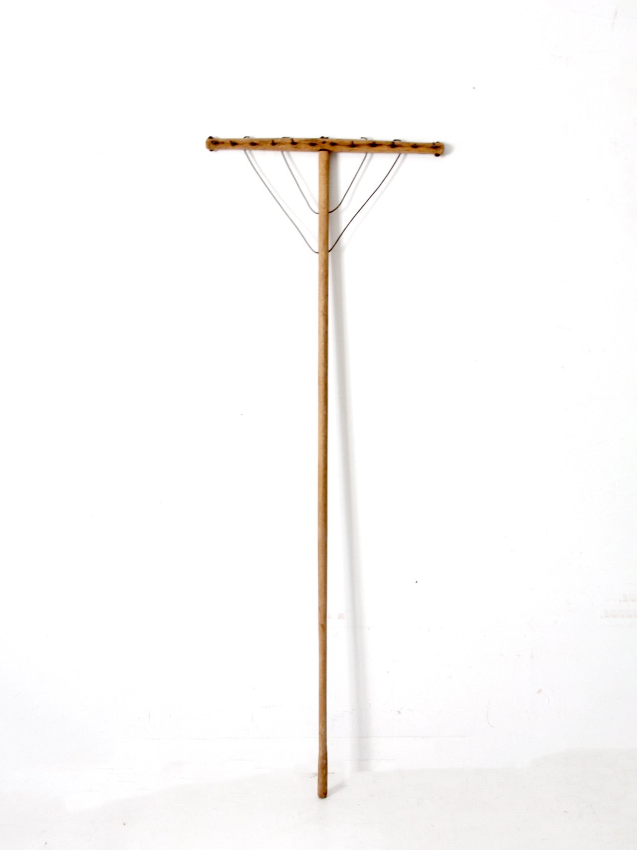 antique wooden hay rake