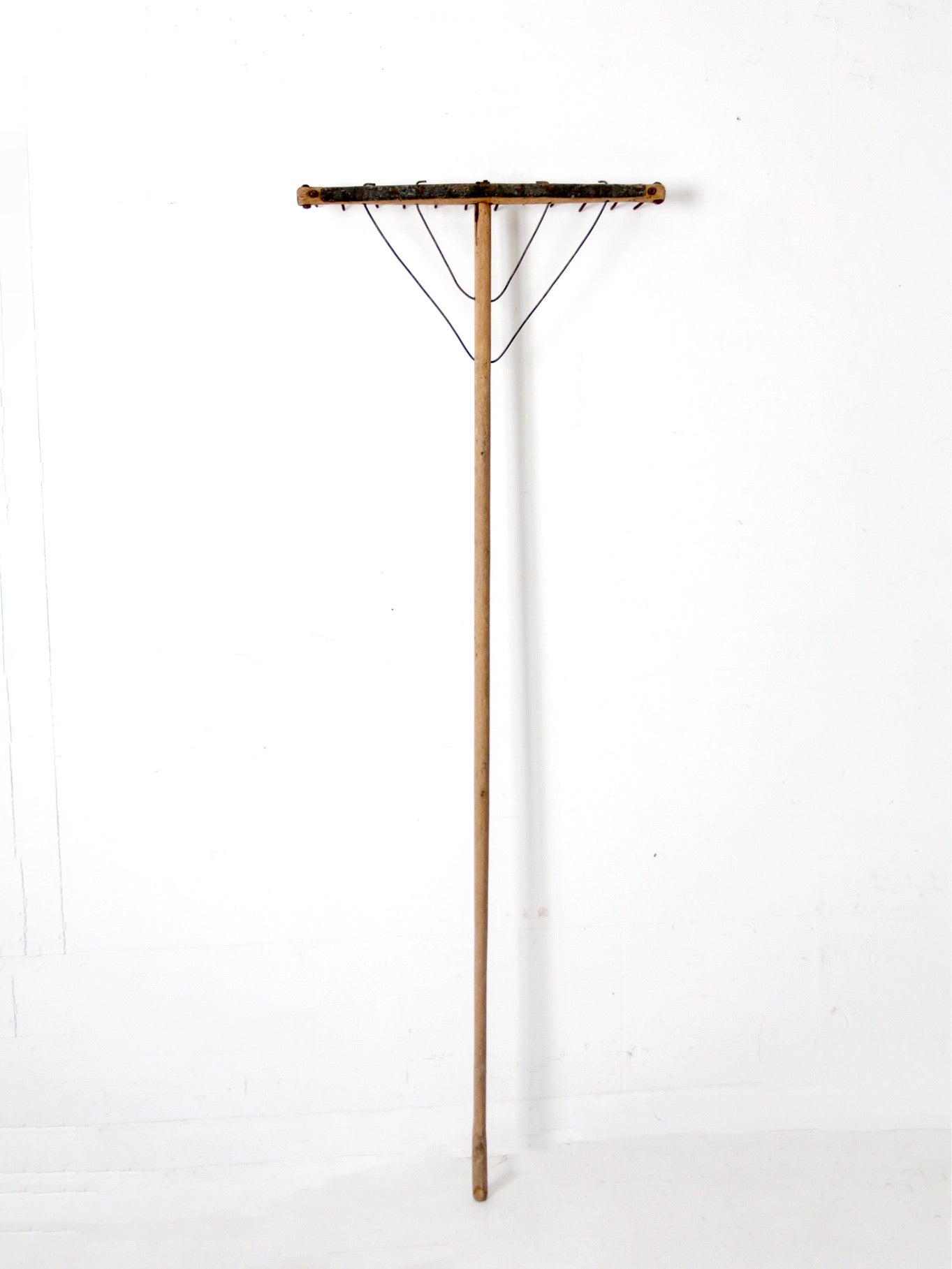 antique wooden hay rake
