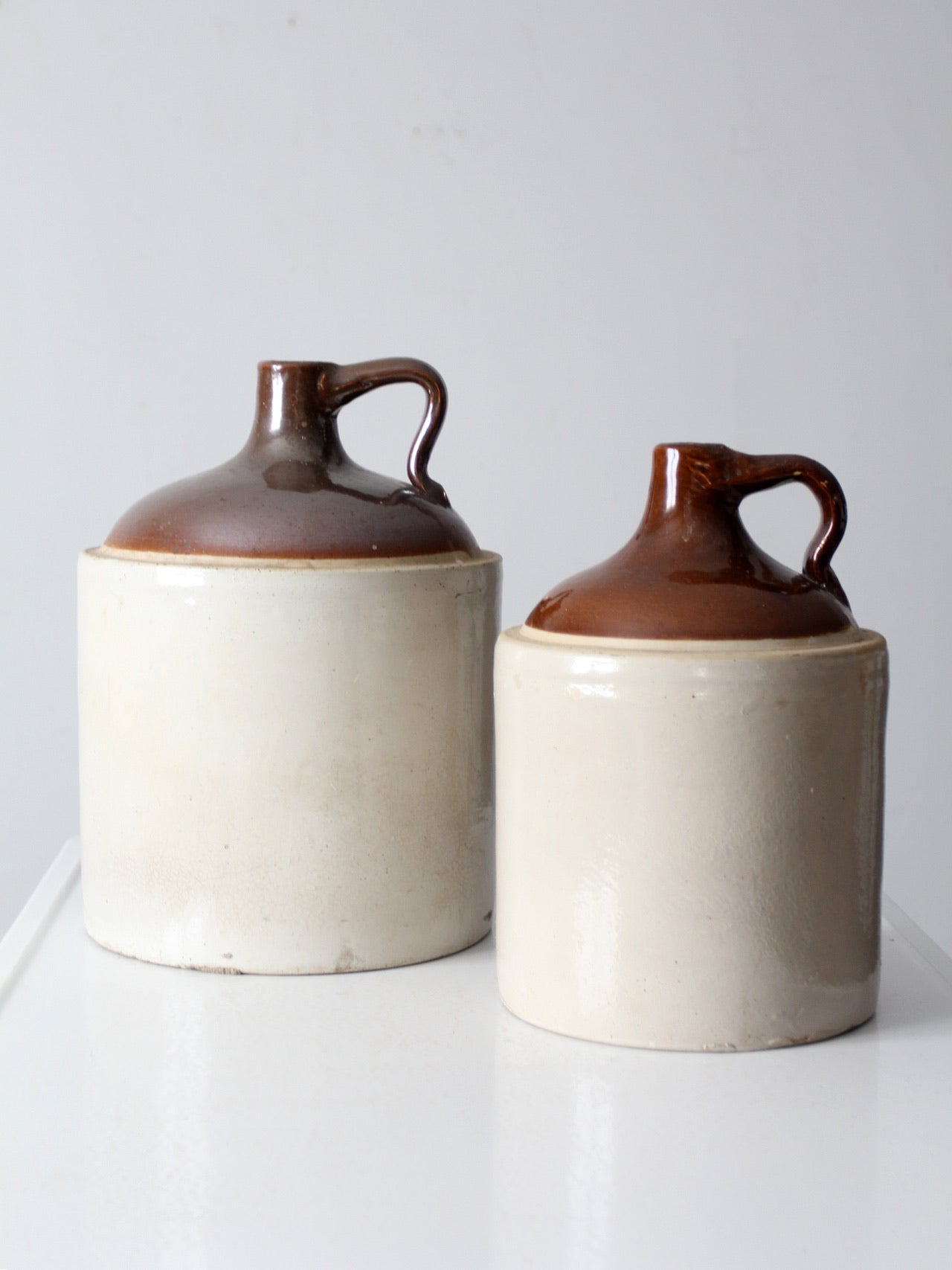 antique stoneware jugs pair