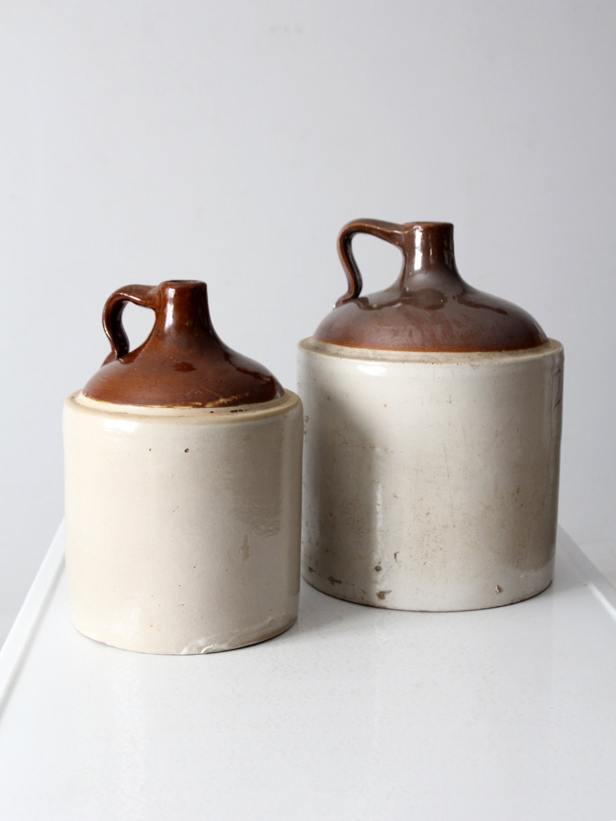 antique stoneware jugs pair