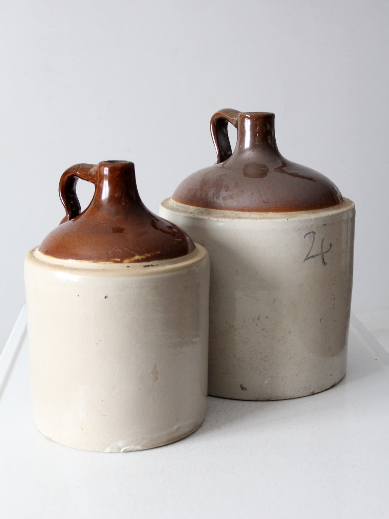 antique stoneware jugs pair