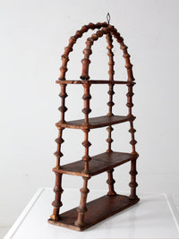 antique folk art spool shelf