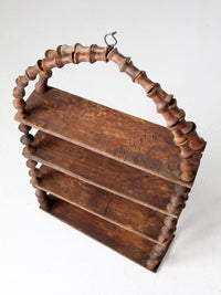 antique folk art spool shelf