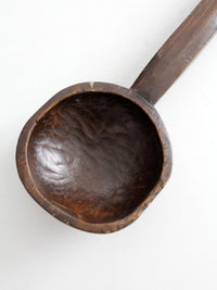 primitive hand-carved wooden spoon