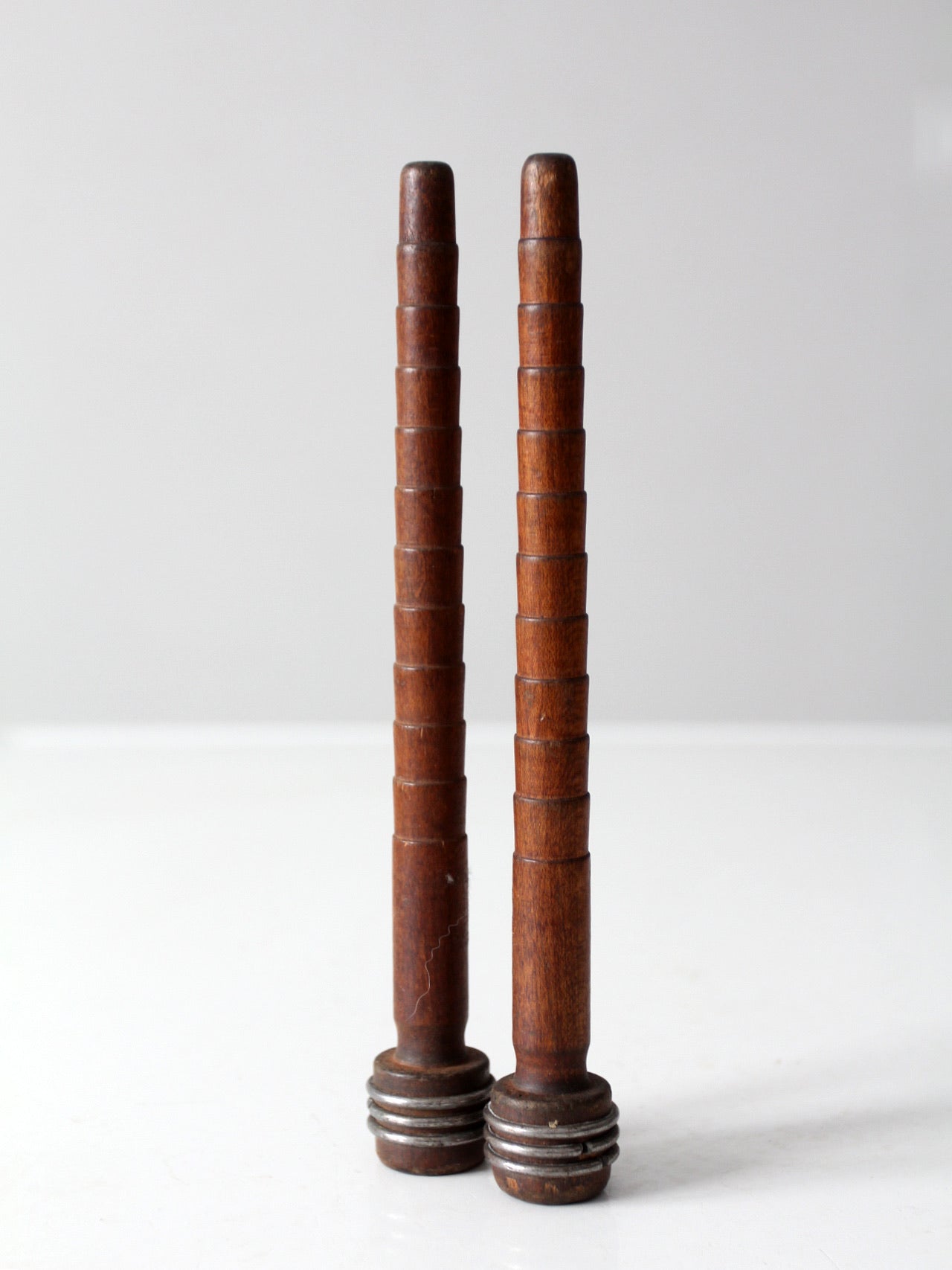 antique wooden textile bobbins pair