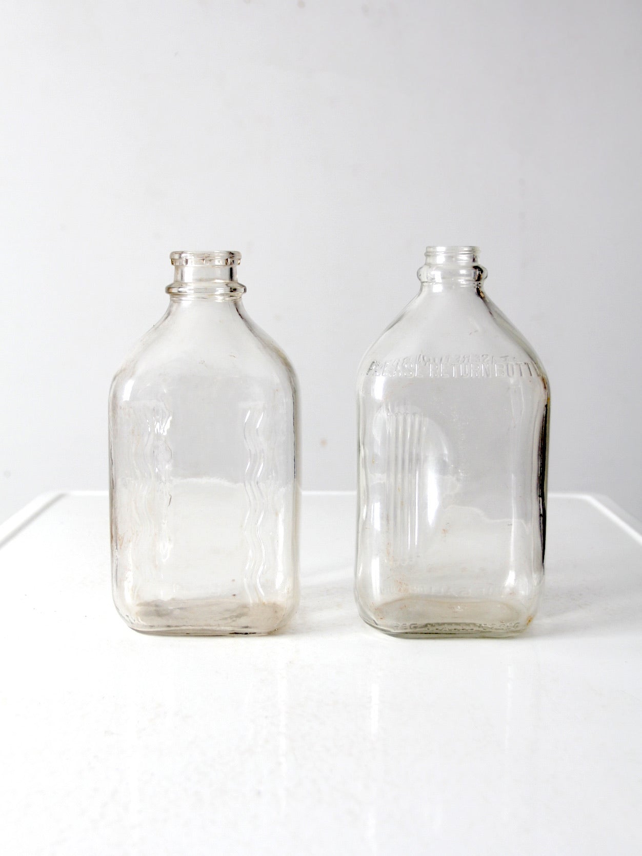 vintage glass milk jugs pair