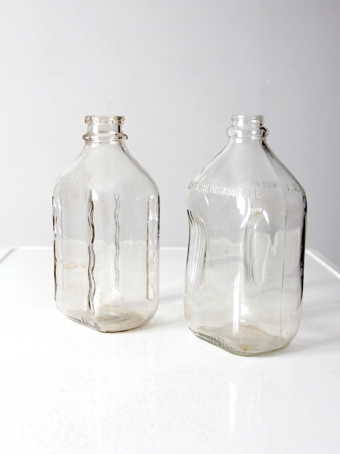 vintage glass milk jugs pair