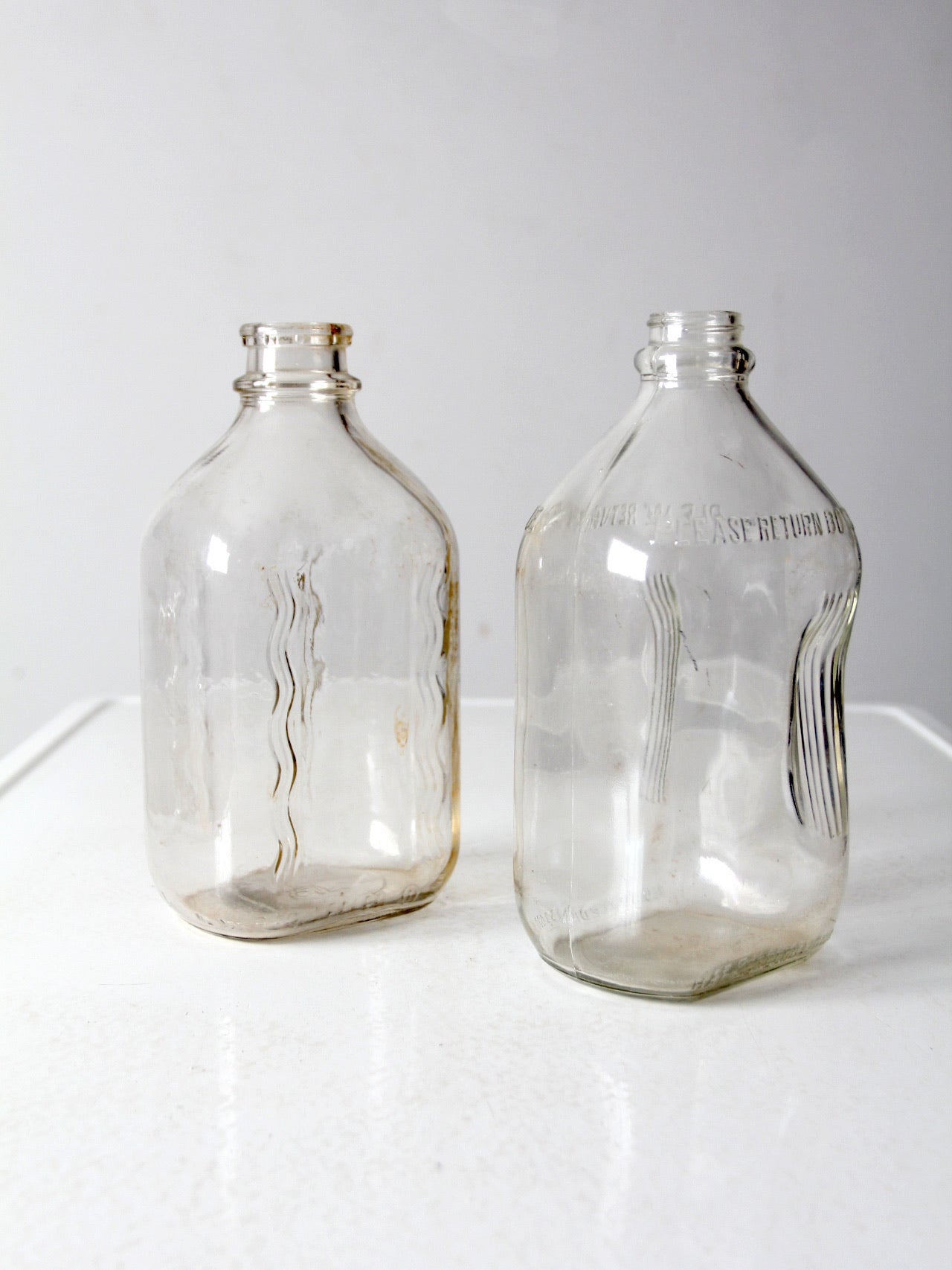 vintage glass milk jugs pair