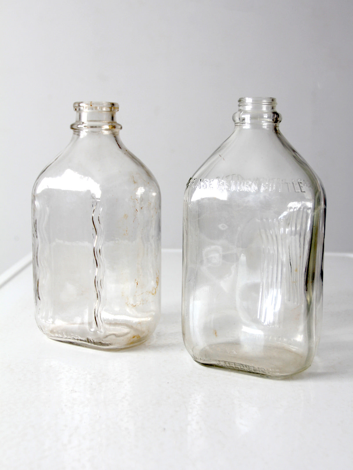 vintage glass milk jugs pair